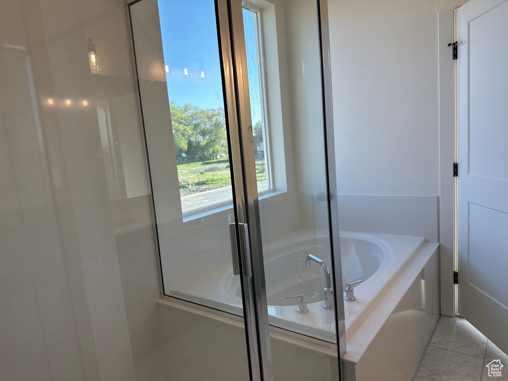 Bathroom featuring a garden tub