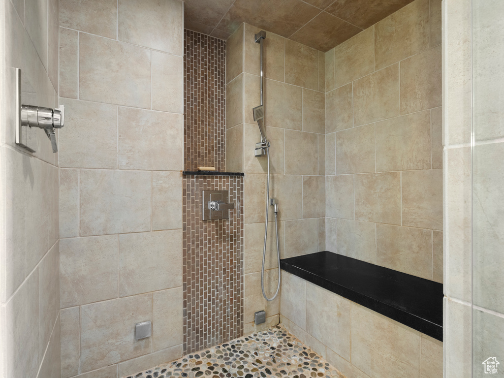 Bathroom featuring tiled shower