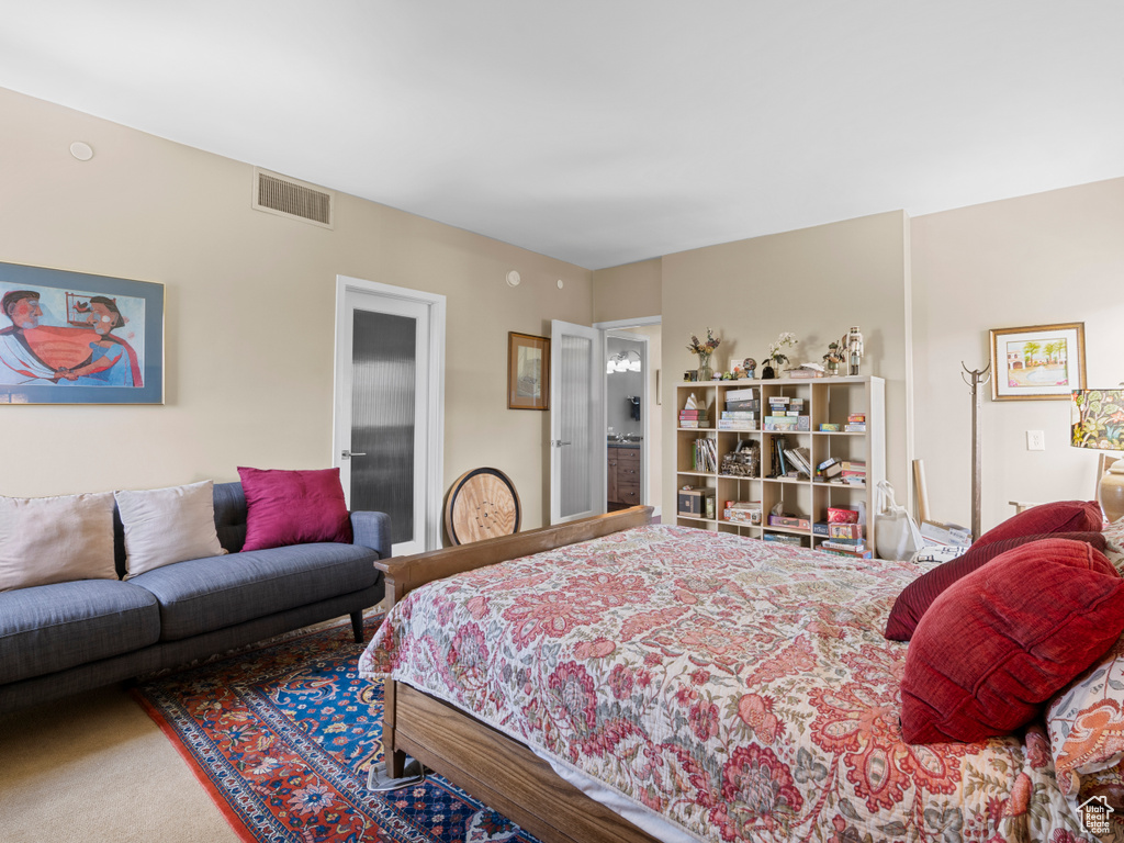 Bedroom featuring carpet floors