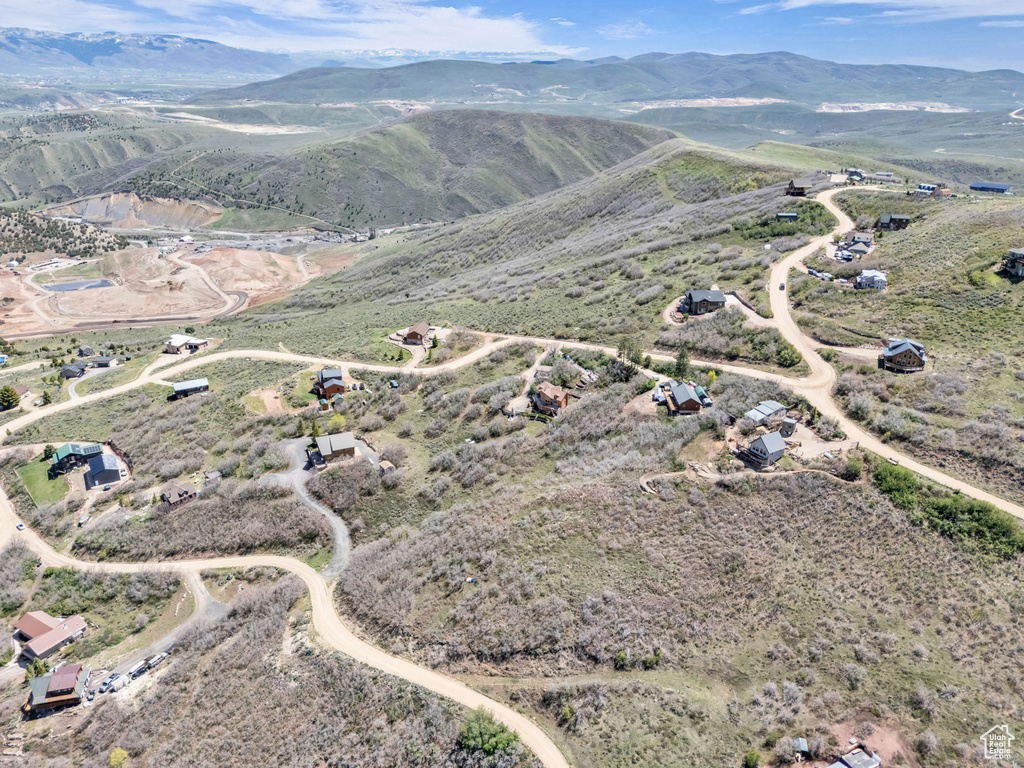 Aerial overview of property\'s location with mountains
