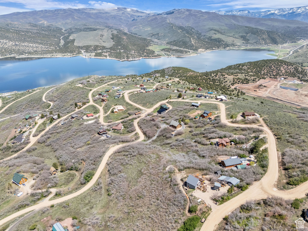 Aerial overview of property\'s location featuring a water and mountain view