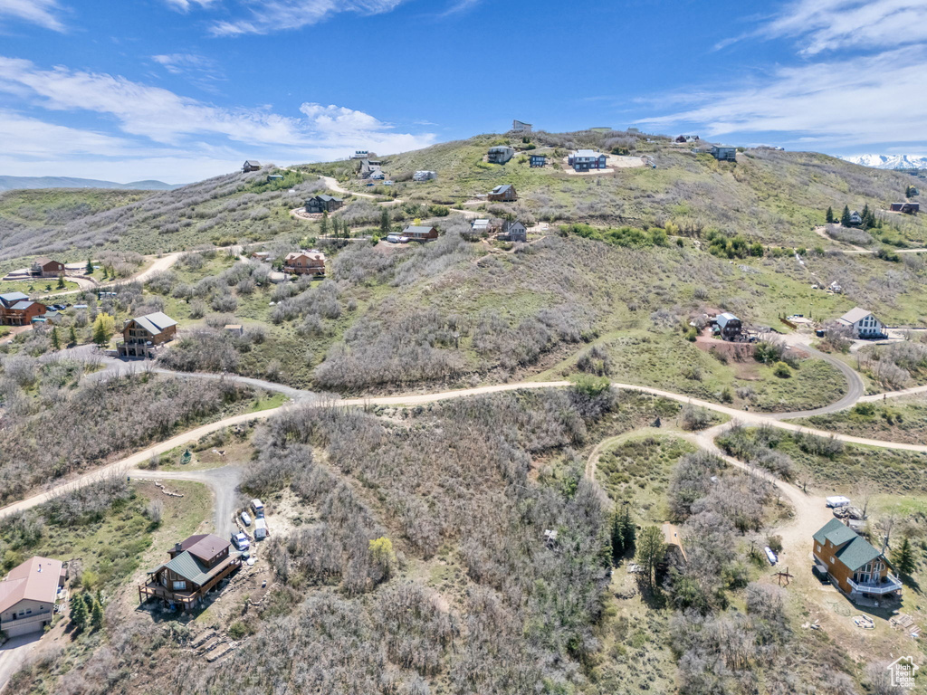 Aerial view of property\'s location with mountains