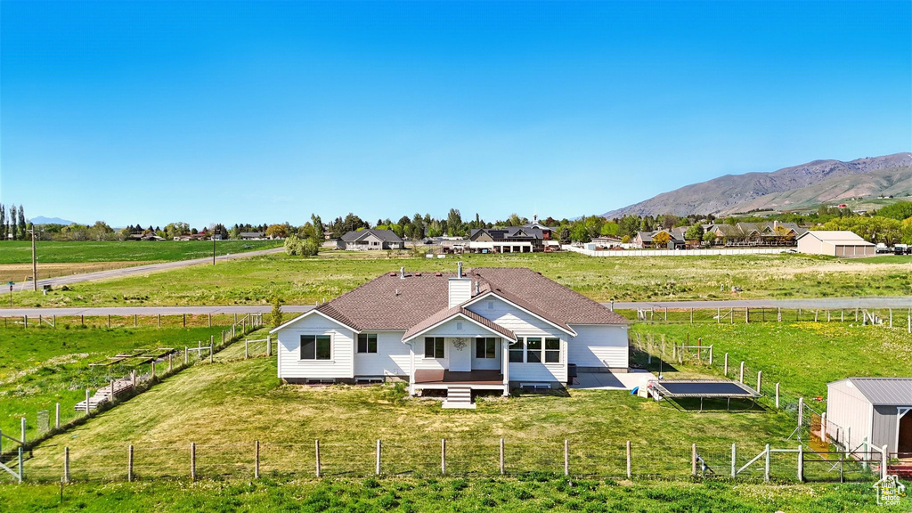 View of subject property with a mountainous background