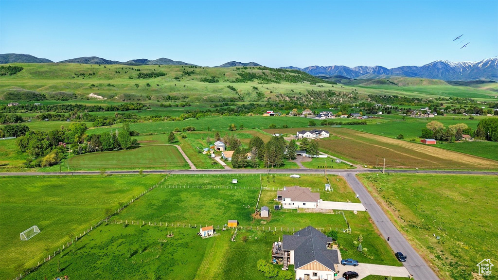 Aerial view of sparsely populated area with a mountainous background