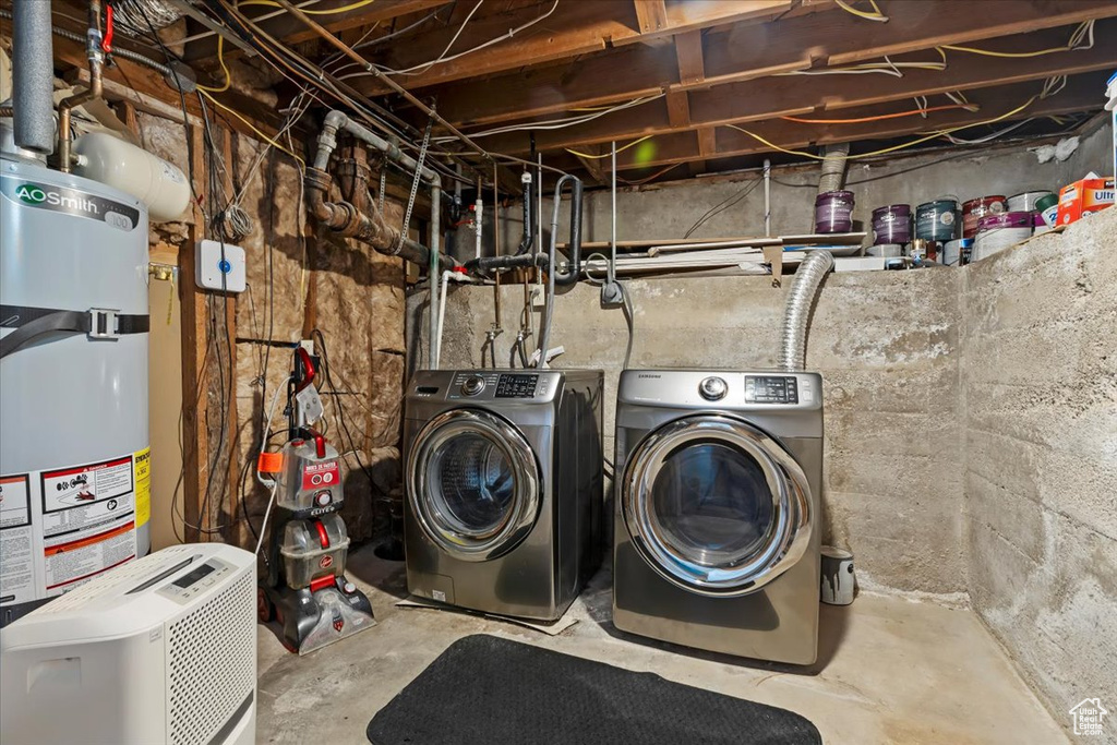 Laundry room with secured water heater and washer and clothes dryer