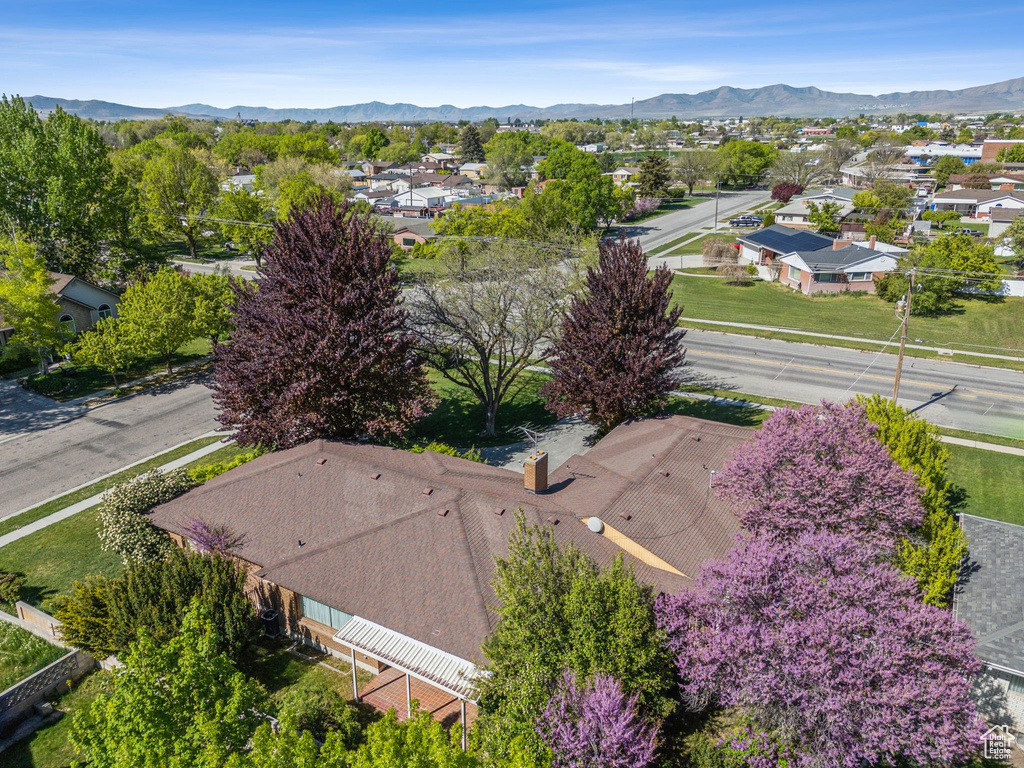 Aerial view of residential area featuring mountains