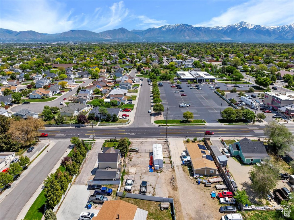 Aerial view of residential area with a mountain backdrop