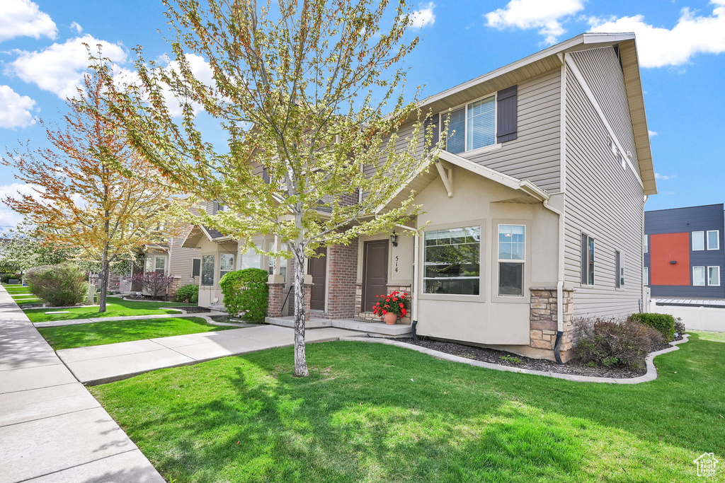 View of front of home with a front lawn