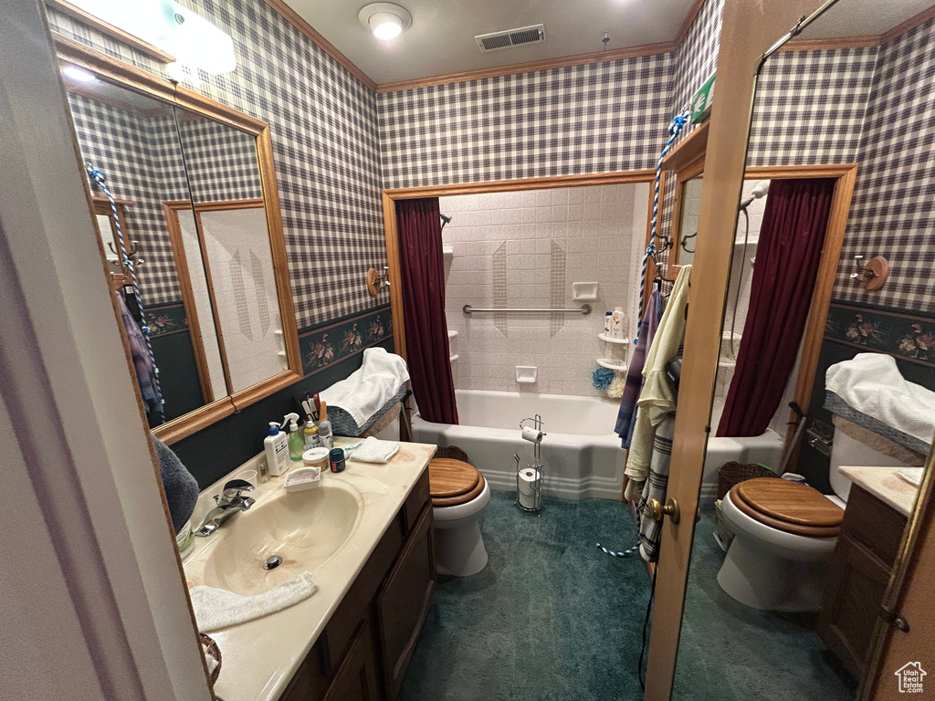 Full bathroom with toilet, vanity, shower / bath combo, and wallpapered walls