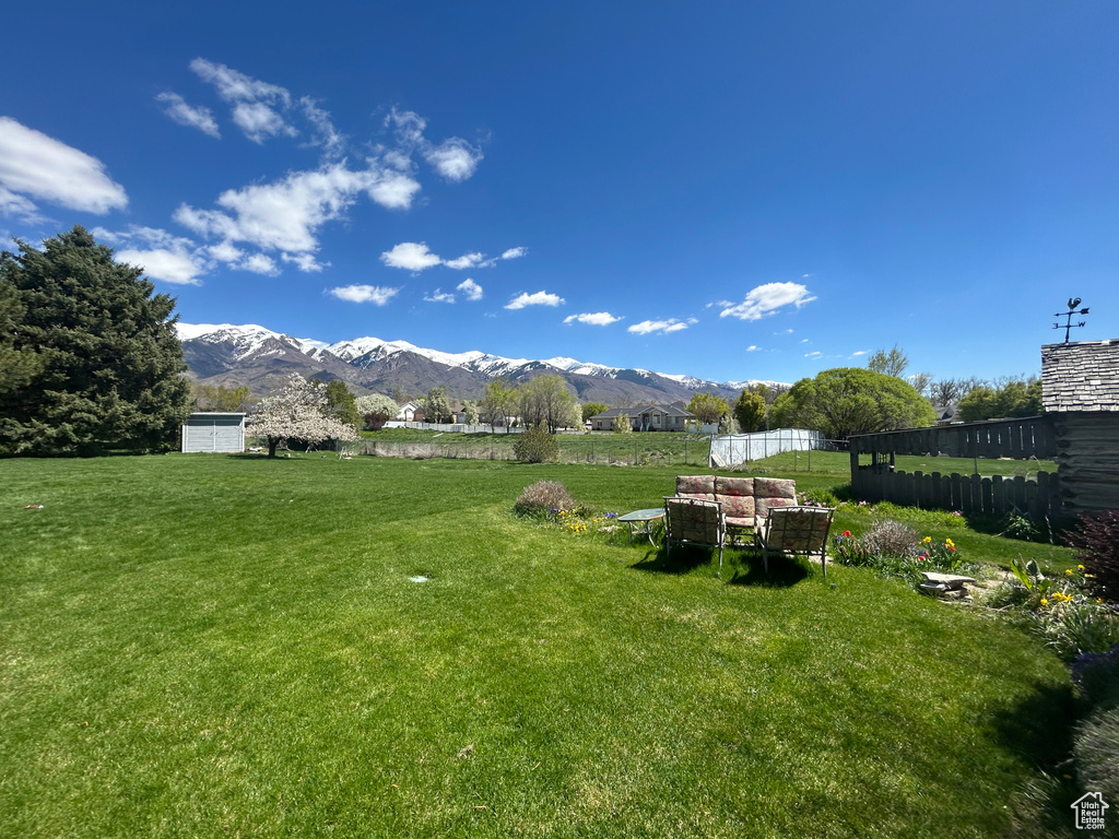 View of yard with a mountain view