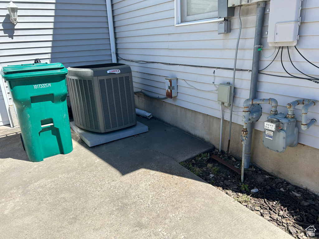 Exterior view of central AC unit and gas meter