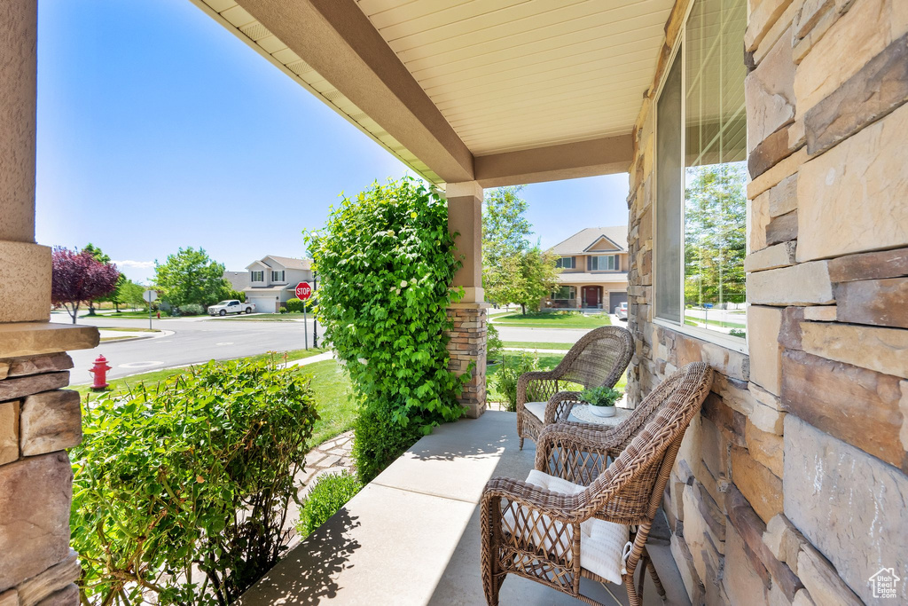 View of patio featuring covered porch