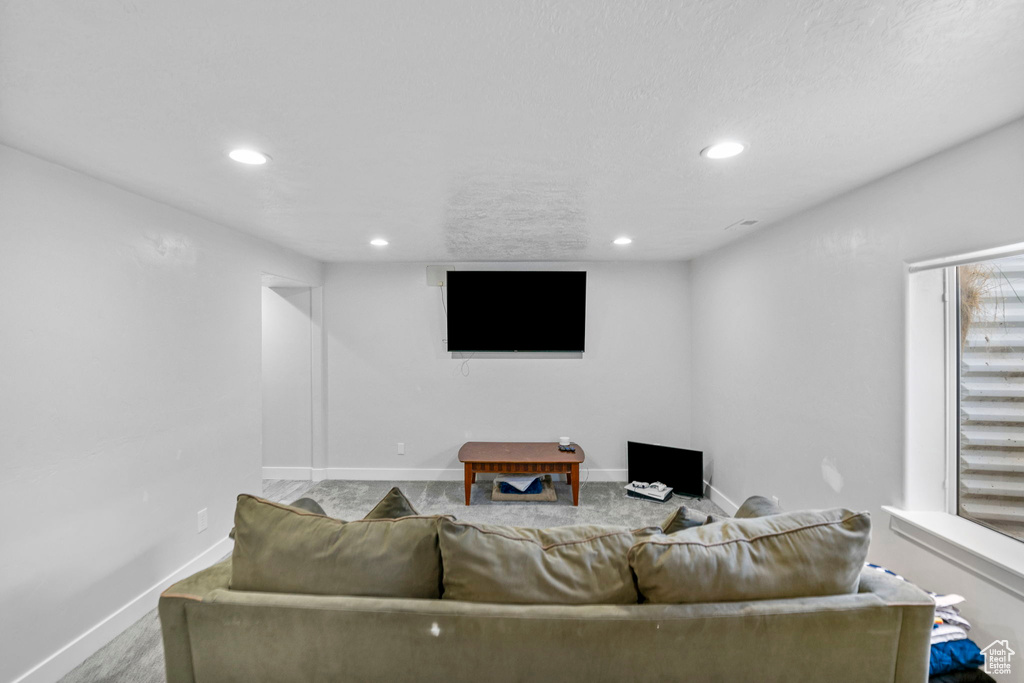 Living area featuring recessed lighting and baseboards