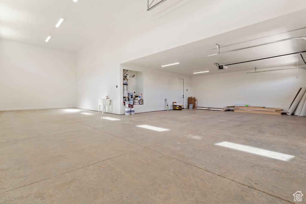 Garage featuring a garage door opener