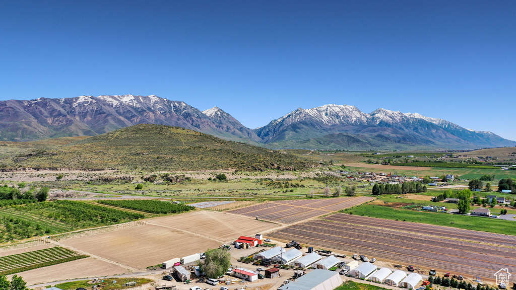 View of mountain background with rural landscape and farmland