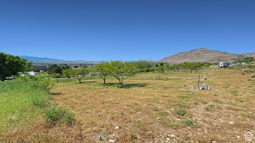 View of mountain background featuring rural landscape