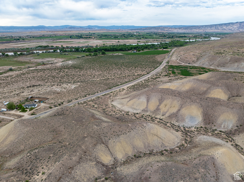 Overview of rural landscape with a mountain backdrop