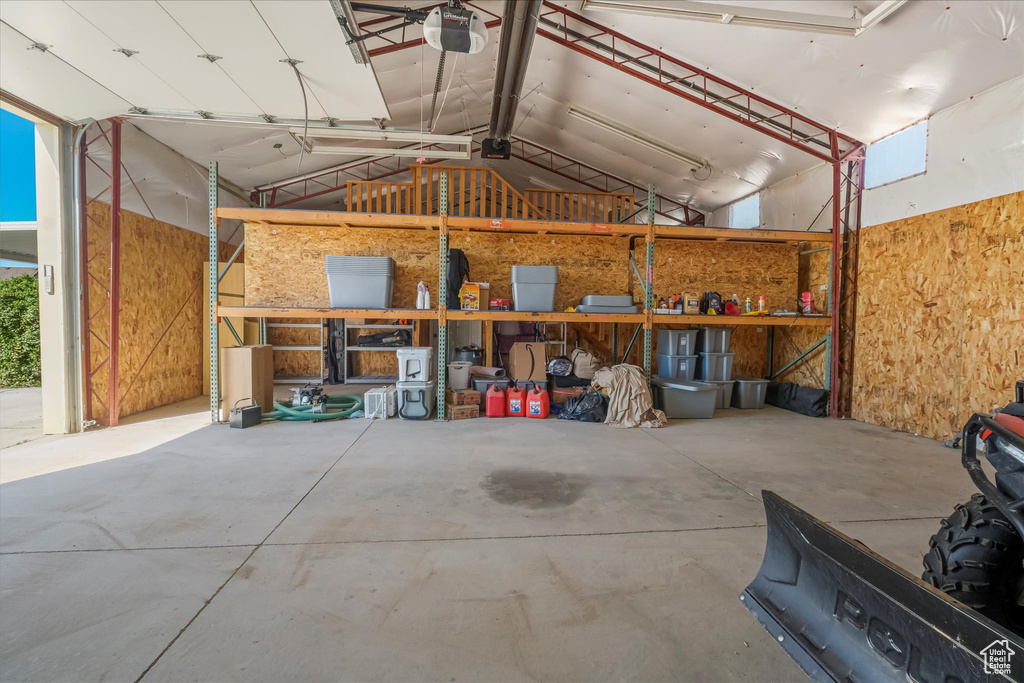Garage featuring a garage door opener