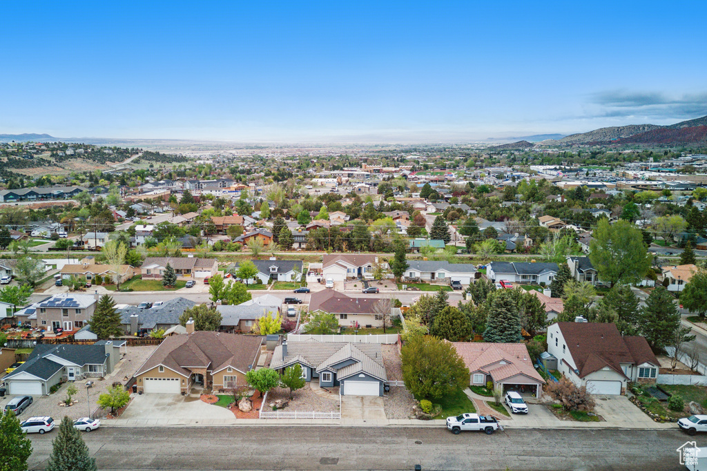 Aerial view of residential area with a mountain backdrop