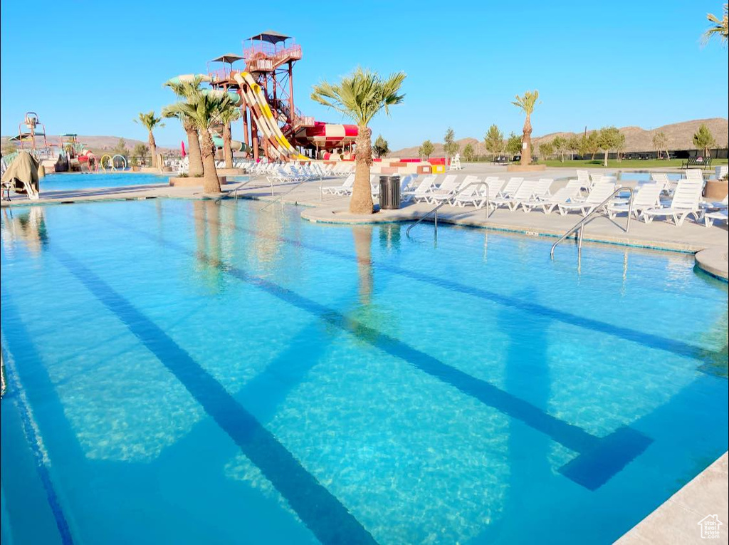 Community pool with a patio area