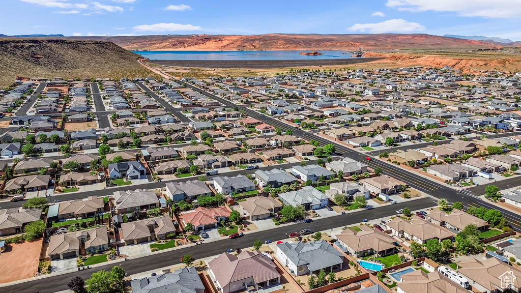 Aerial view of residential area featuring a water and mountain view