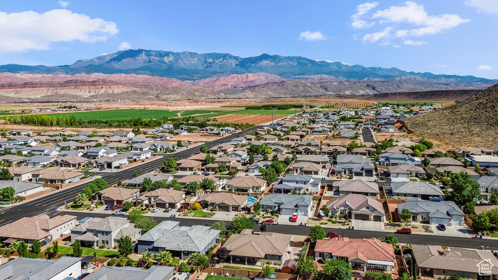 Aerial view of residential area with a mountain backdrop