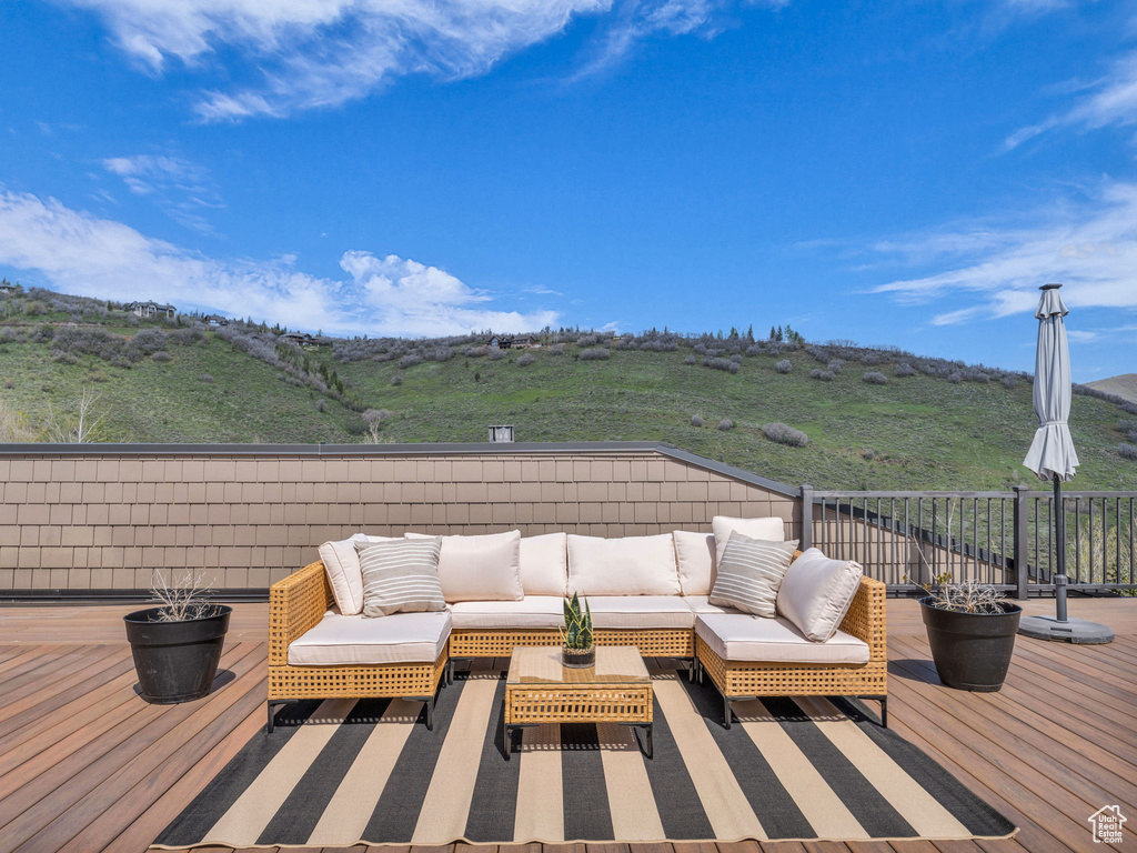 Wooden deck with an outdoor hangout area