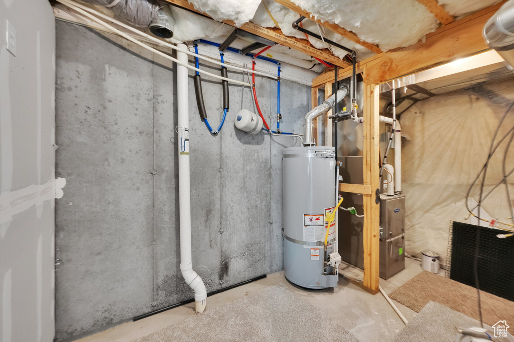 Utility room with gas water heater
