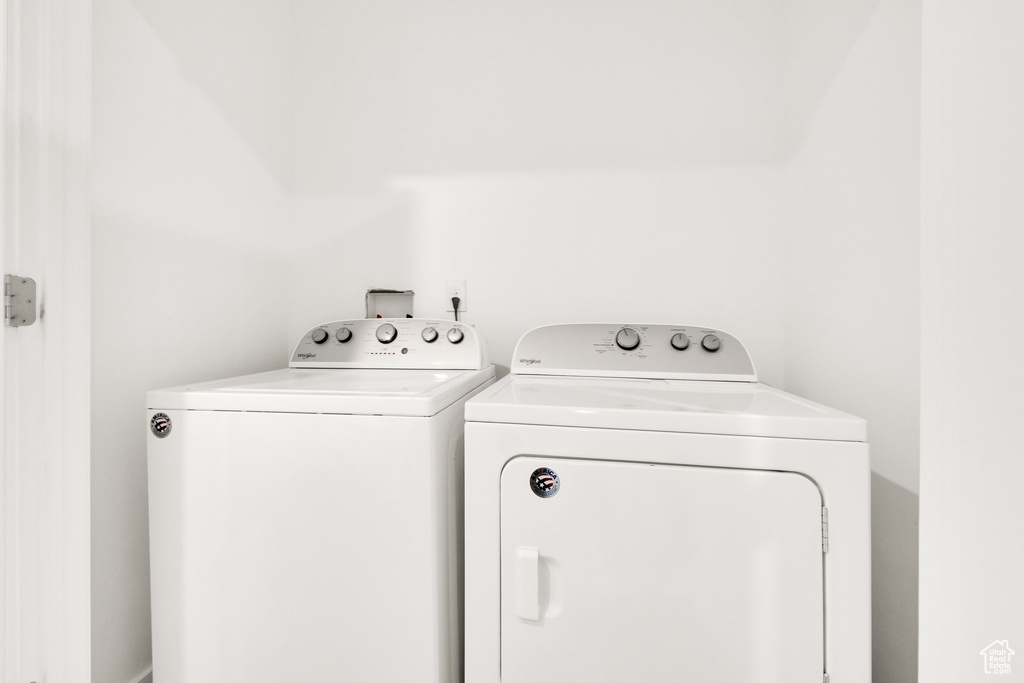 Laundry area with separate washer and dryer