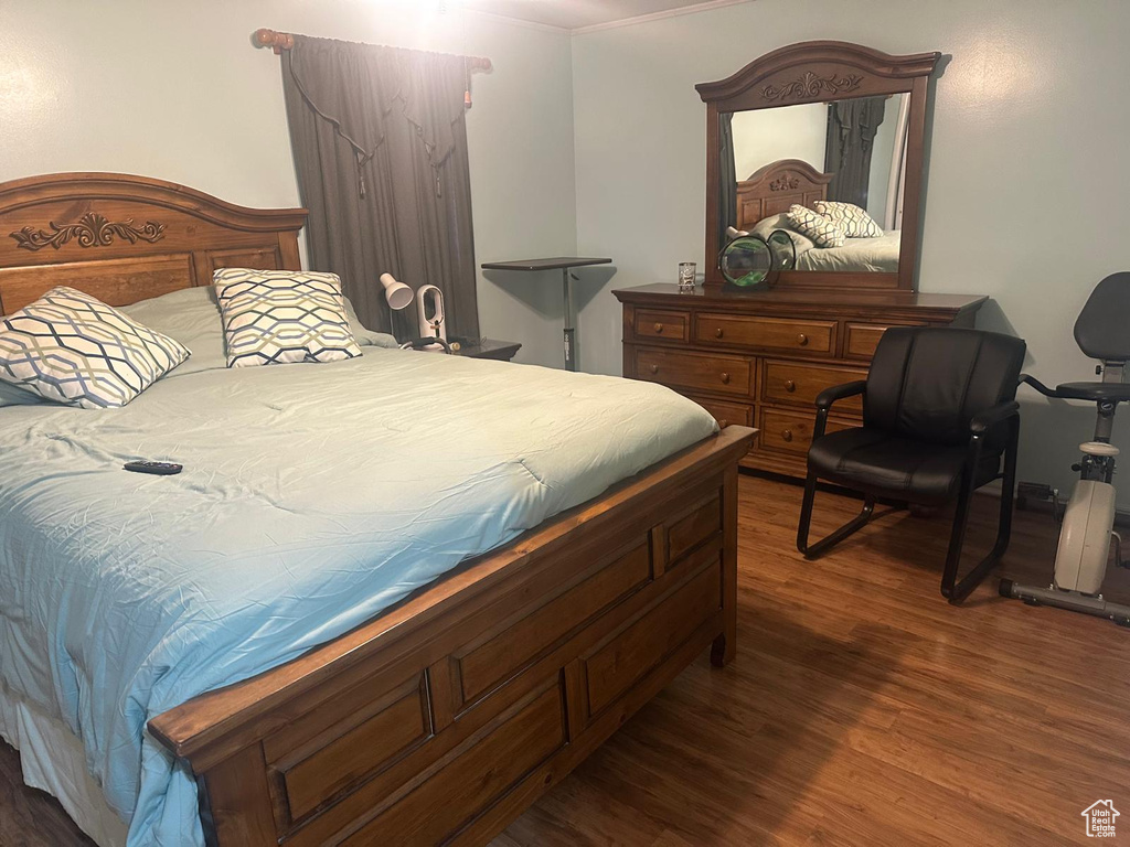 Bedroom featuring wood finished floors