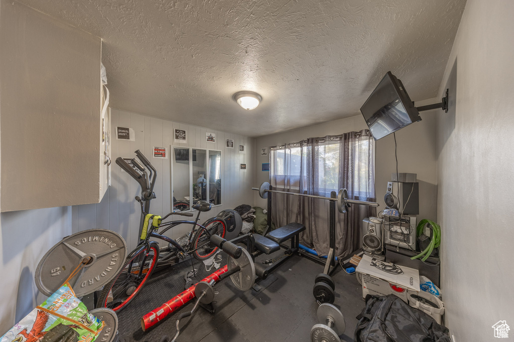 Workout area with a textured ceiling