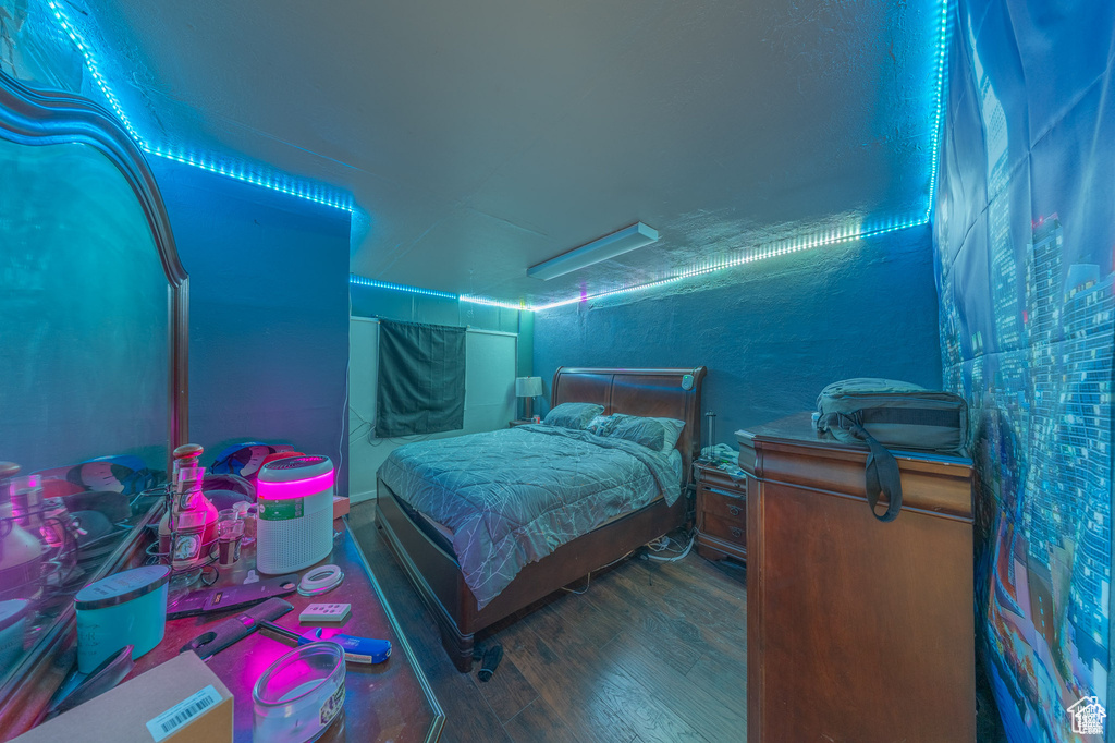 Bedroom with wood finished floors