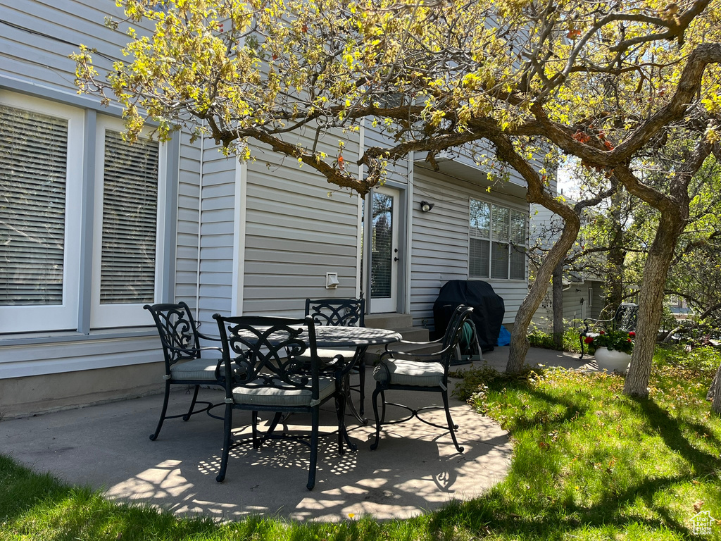 View of patio with outdoor dining space
