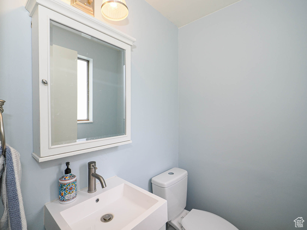 Bathroom with a sink and toilet