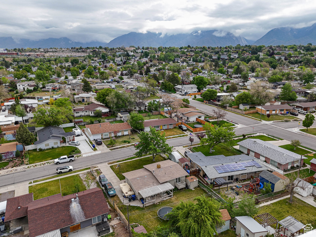 Aerial view of residential area with a mountain backdrop