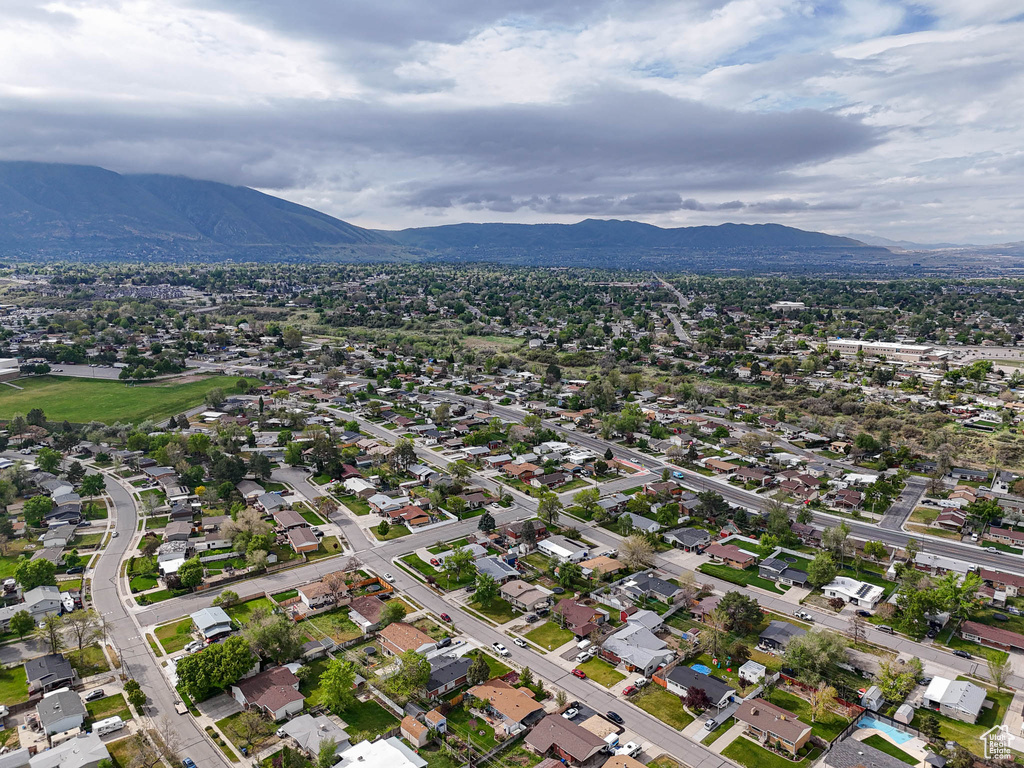 Aerial overview of property\\\\\\\\\\\\\\\\\\\\\\\\\\\\\\\'s location featuring a mountainous background and nearby suburban area