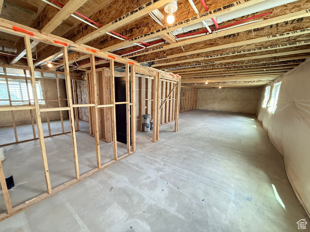 Basement featuring plenty of natural light