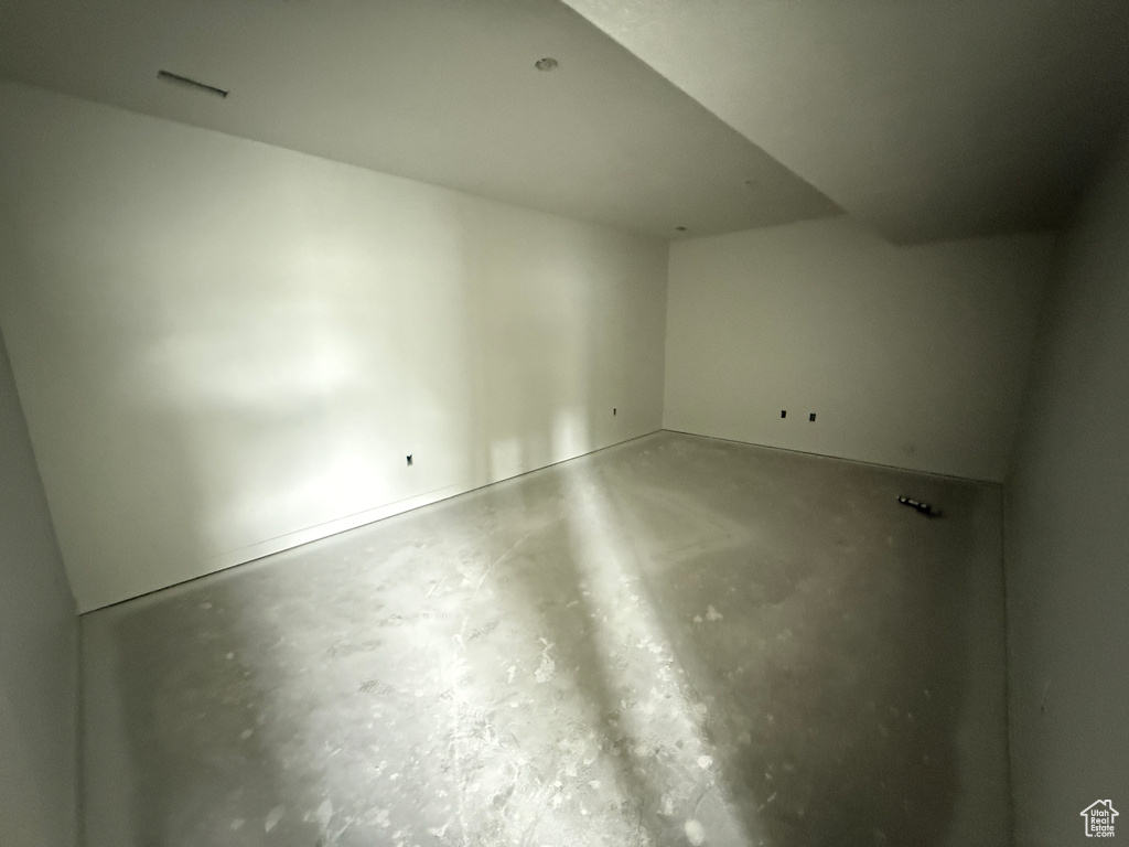 Additional living space with concrete flooring