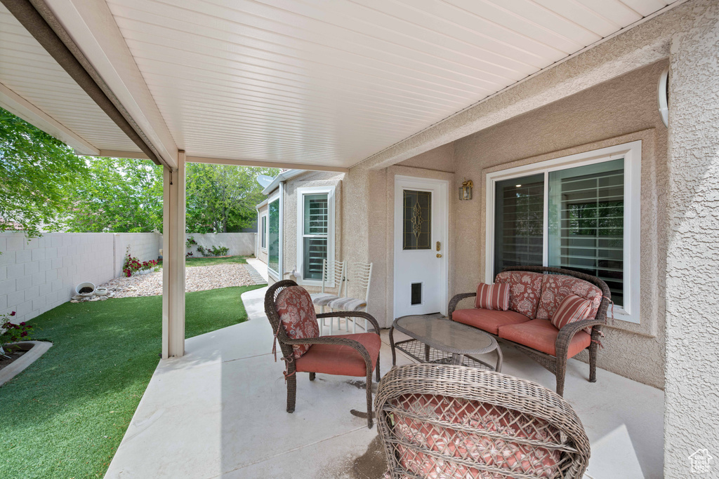 View of patio with an outdoor living space