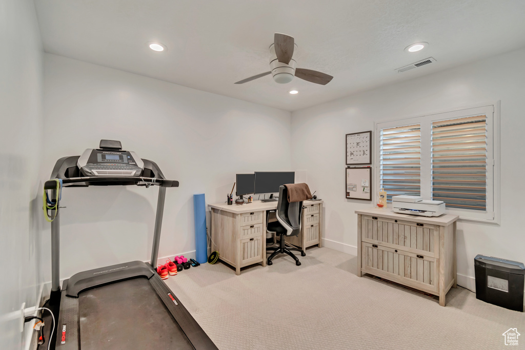 Carpeted home office with a ceiling fan, recessed lighting, and baseboards