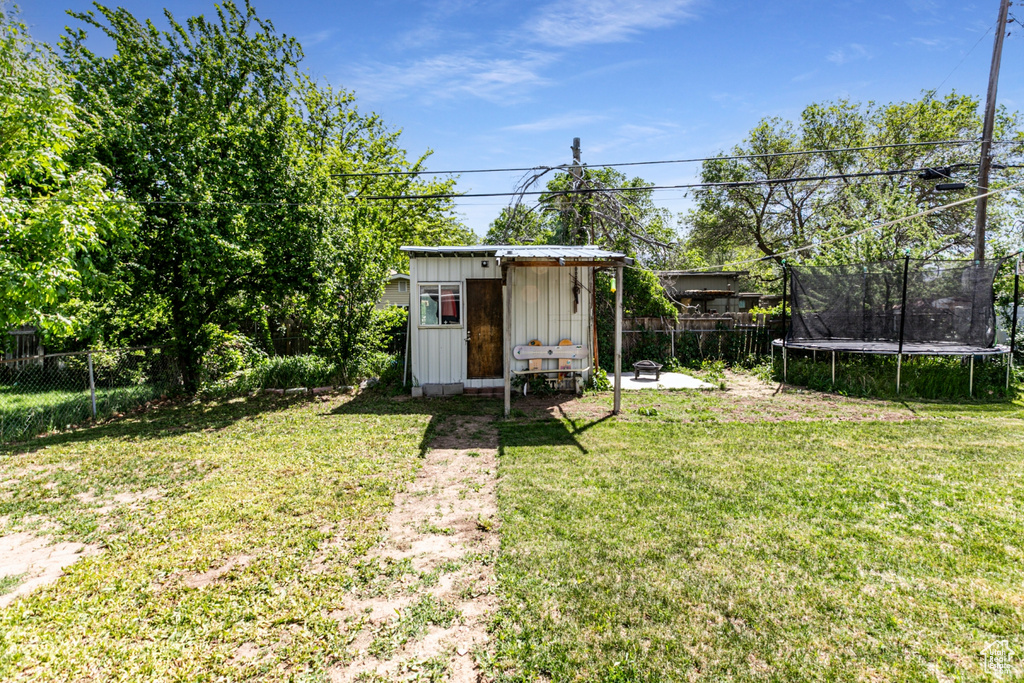 View of shed featuring a trampoline