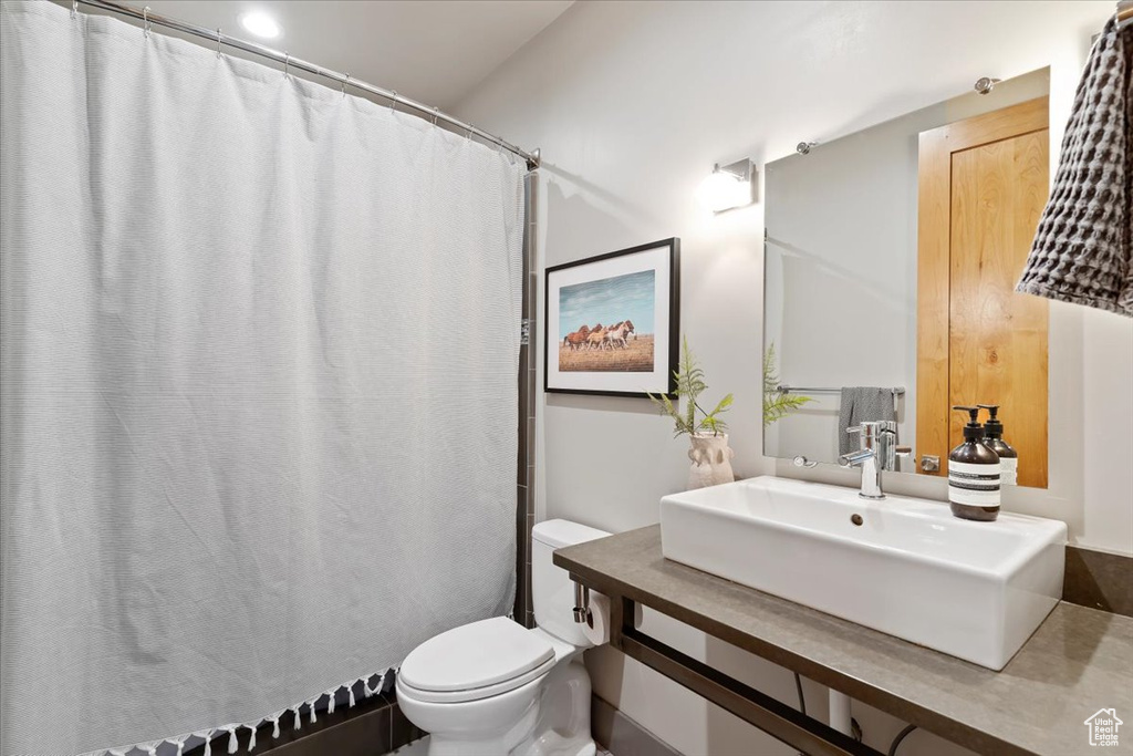 Bathroom featuring a sink and toilet