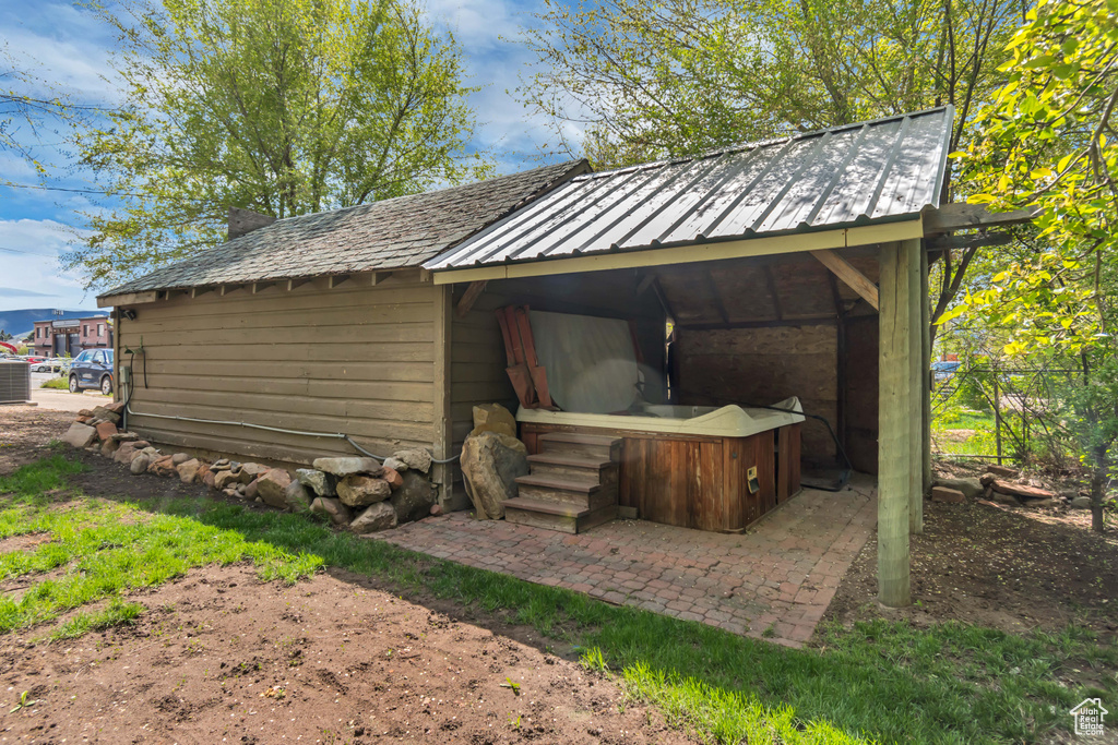 View of outdoor structure featuring an outdoor structure and cooling unit