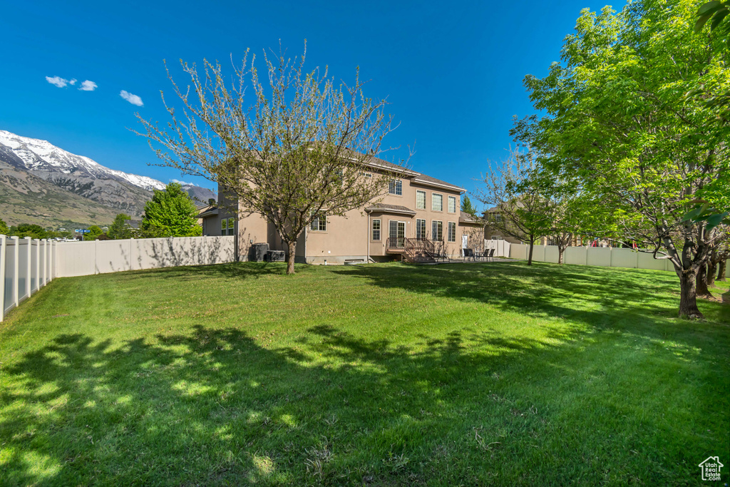 View of yard with a mountain view