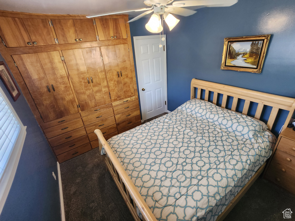 Bedroom with carpet and ceiling fan
