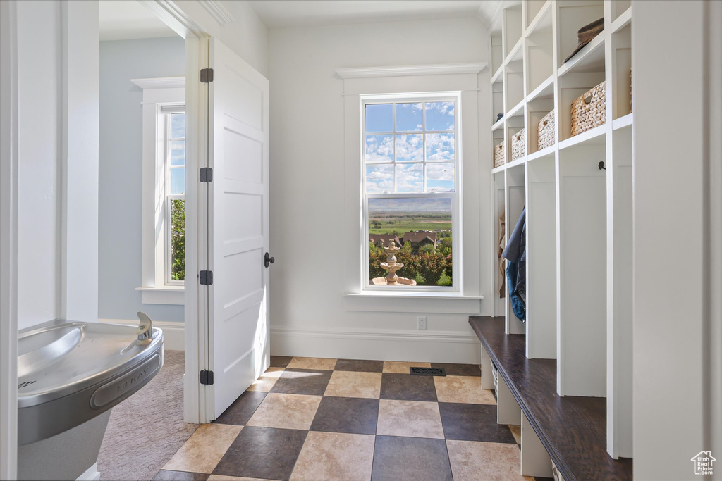 Mudroom featuring baseboards