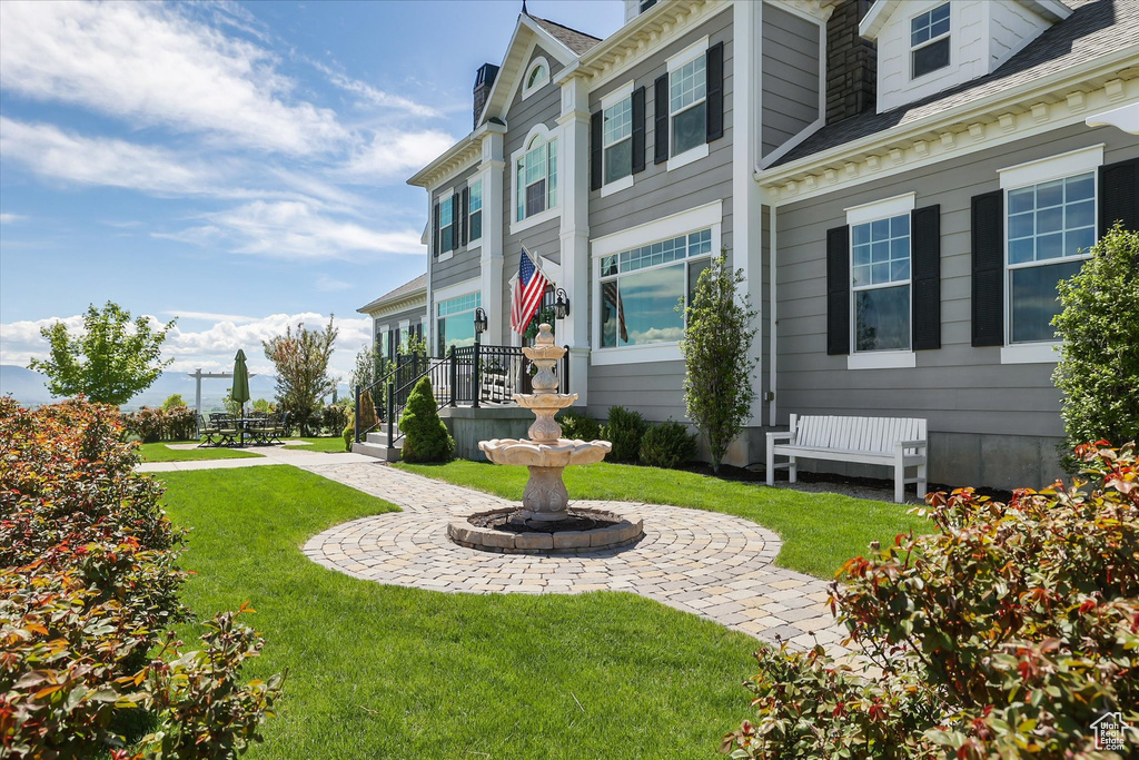 Exterior space featuring a yard