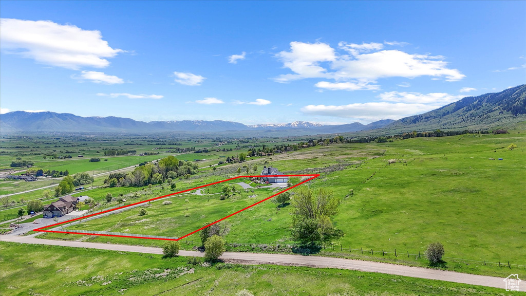 View of rural area featuring mountains, a pastoral area, and property boundaries highlighted