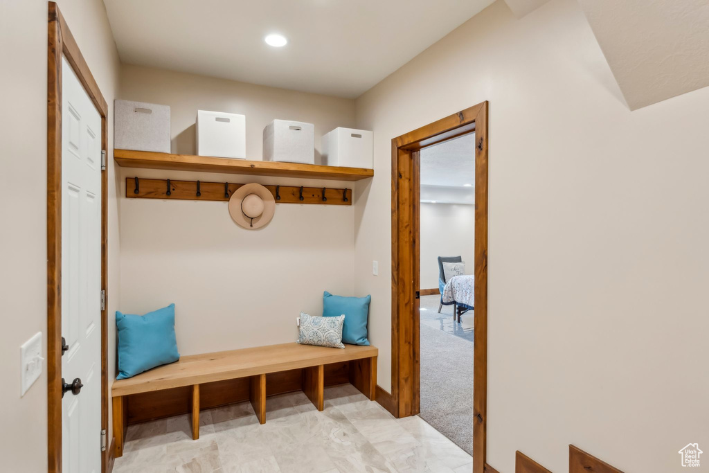 Mudroom featuring recessed lighting and baseboards