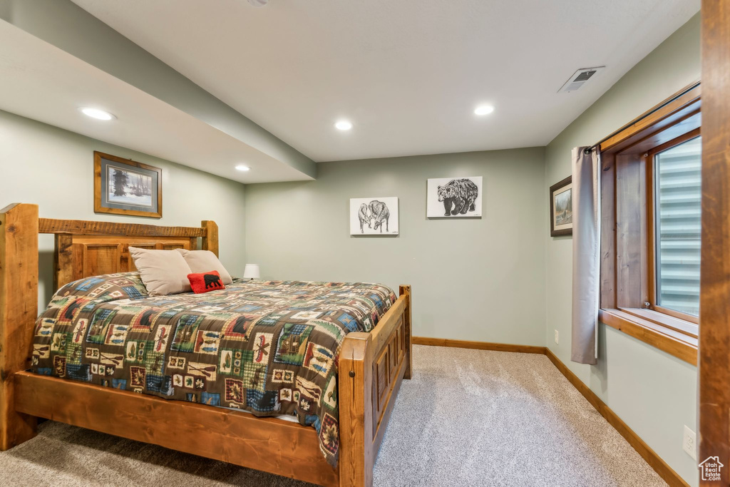 Bedroom featuring carpet floors, baseboards, and recessed lighting